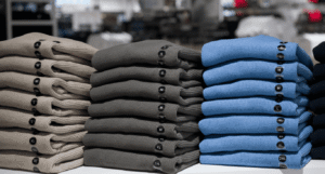 Sweaters with size label stickers from Mark Bric